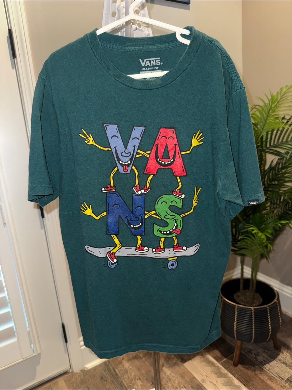 Vans Teal Short Sleeve Tee with Multicolor Skateboard Graphic size medium 10/12